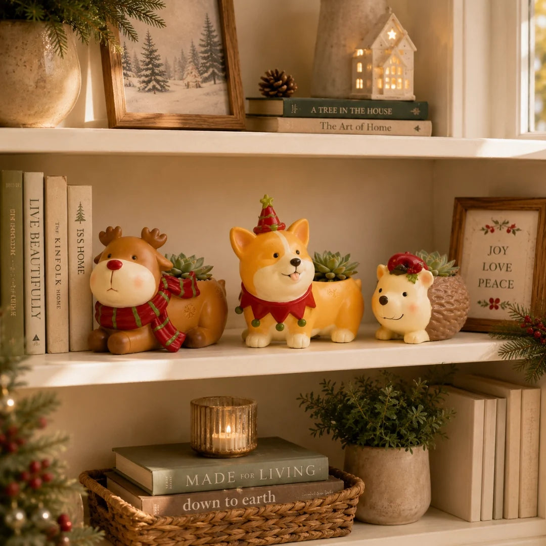 Christmas animal planters displayed on bookshelf
